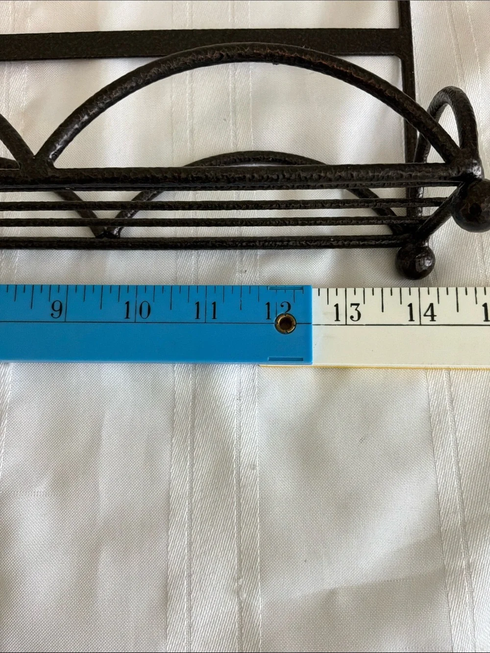 Decorative Brown Metal Wall Rack with Scroll Design